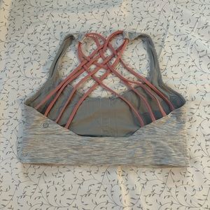 SOLD Lululemon strappy back long lined sports bra. Size 12.